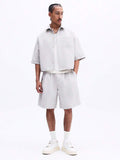 Conjunto Nømad gris claro